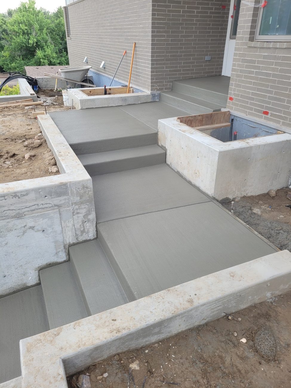 Concrete steps and walkway at building